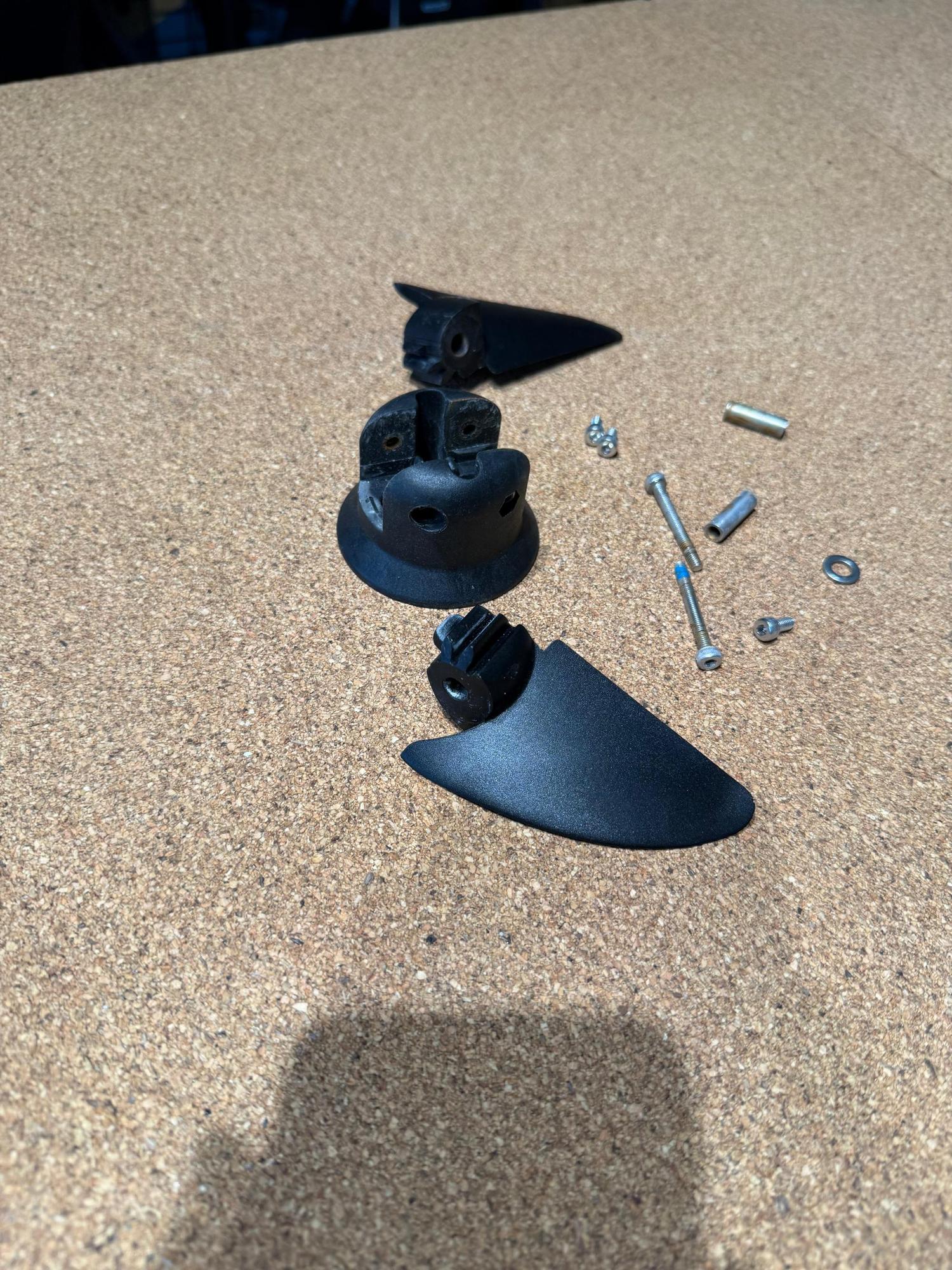 Used Duotone Foil Assist ePropeller 2-blade SLS set with black aluminium blades, mounting hub, and assembly hardware.