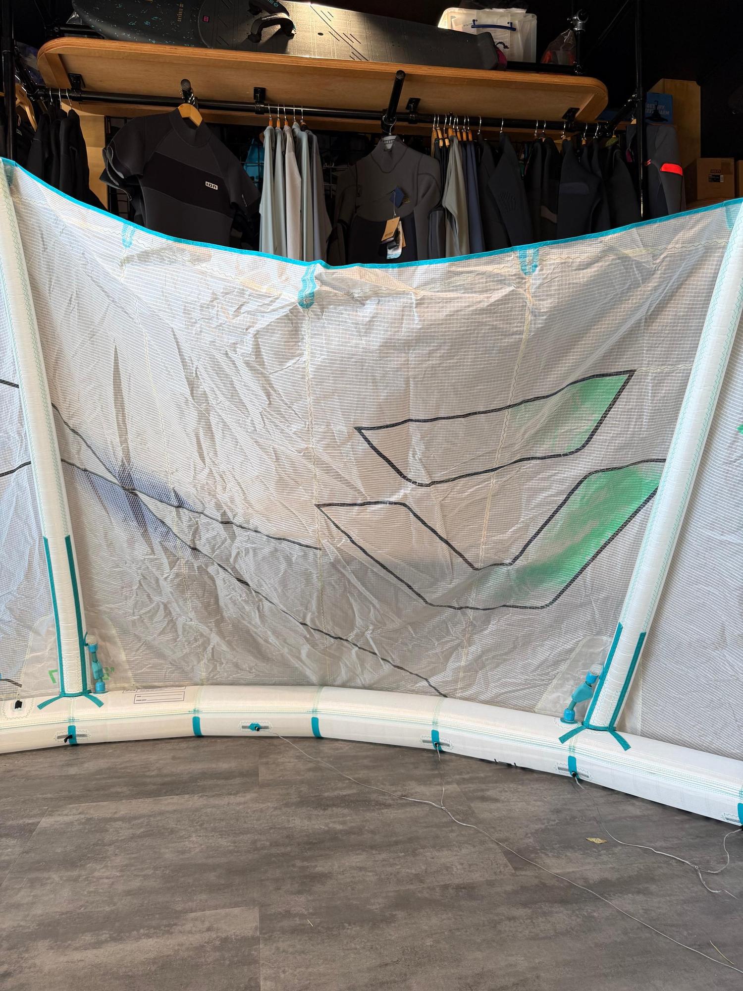 Used 7m Duotone Rebel SLS Concept Blue kite in white with teal accents and high-performance Penta TX material.