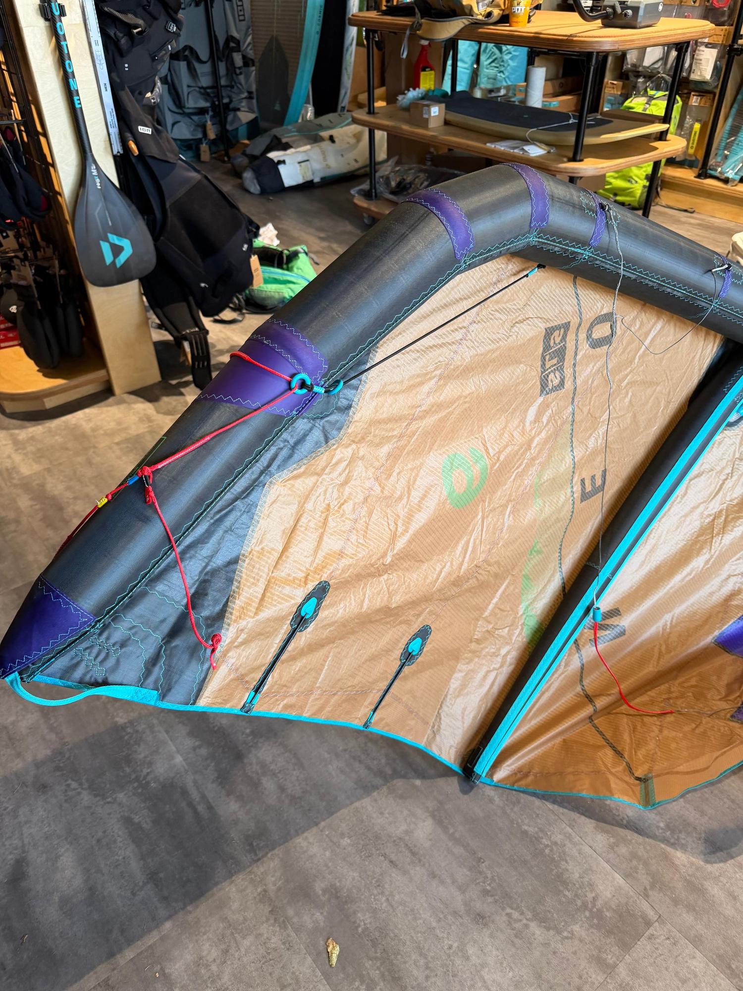 Used 6m Duotone Neo SLS wave kite in black, tan, and teal with Penta TX material and reinforced trailing edge battens.