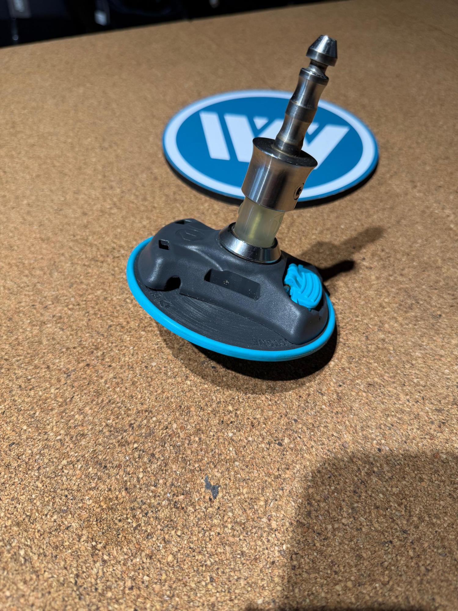 Used Duotone iBase 2.0 windsurfing mast base with iTendon, featuring a grey plastic base, blue trim, and metal pin.